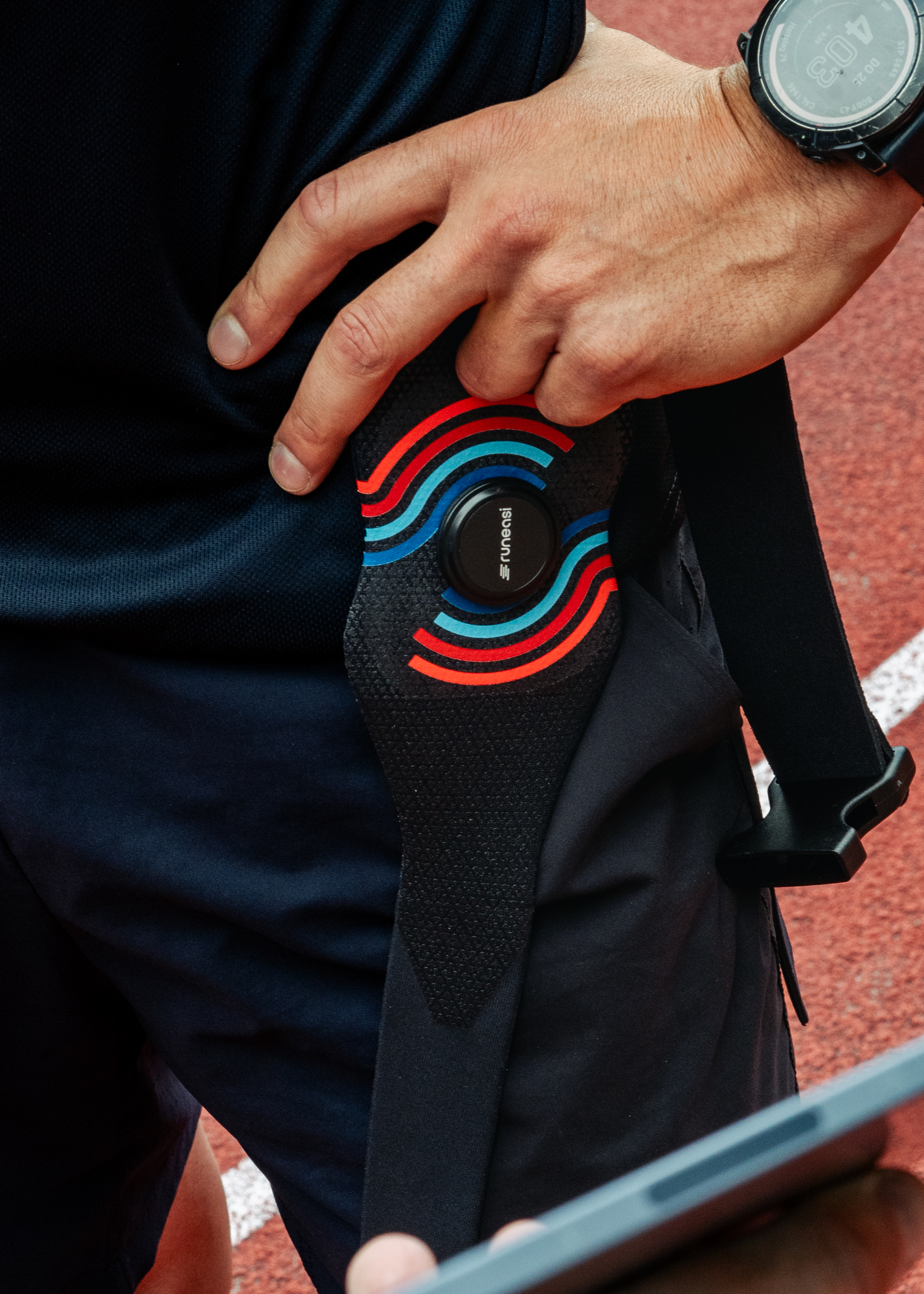 RunEasi wearable biomechanics sensor fitted to a runner's leg